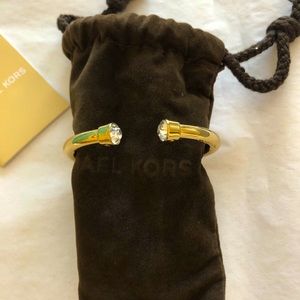Michael Kors hinged bracelet with rhinestones.